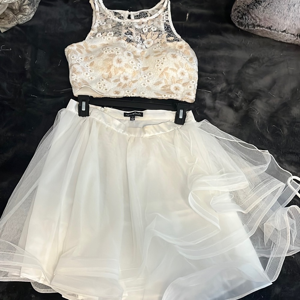 Homecoming 2 piece Worn once. Super cute on!! Fully lined Gold/cream